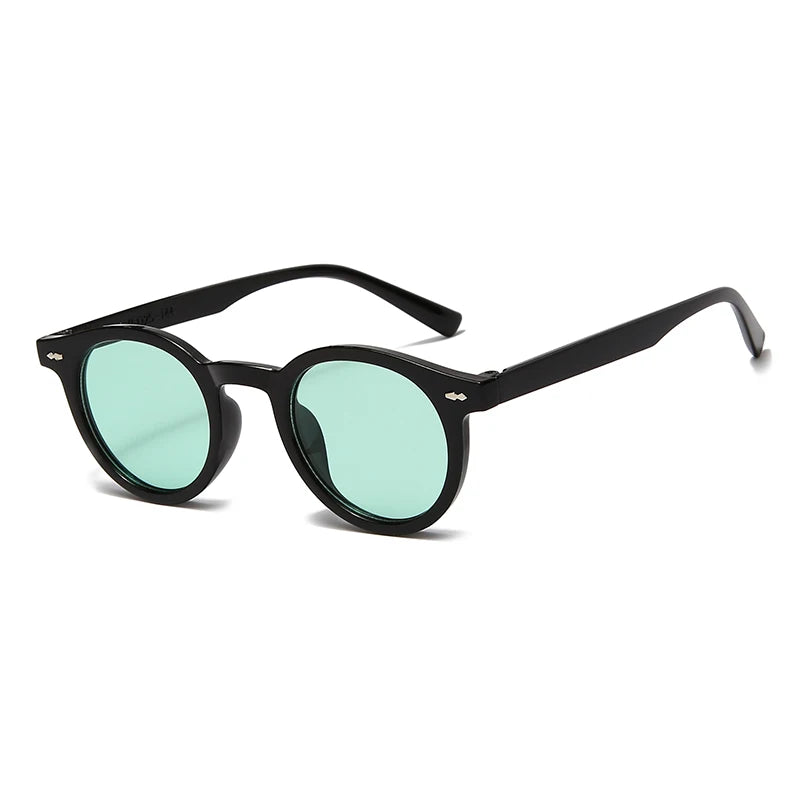 Lunettes noires à verres verts